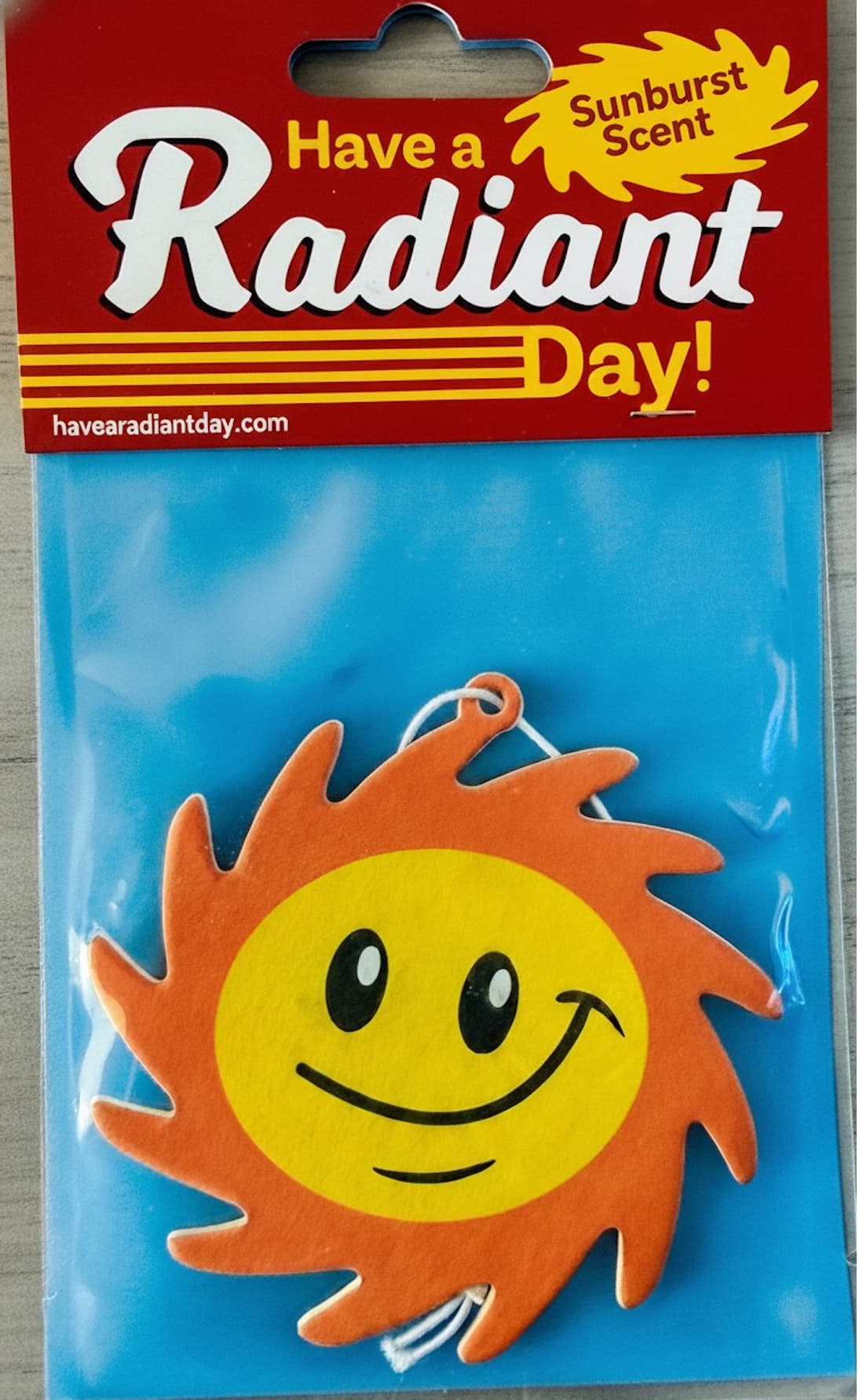 Have a Radiant Day Sunburst Scent car air freshener in retail pack
